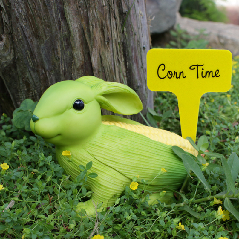 Green And Yellow Whimsical Resin Corn Rabbit Garden Statue - Unique Outdoor Yard Art Figurine with Decorative Sign